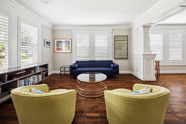 446 Arlington St, Houston, TX 77007 - living area featuring baseboards, wood finished floors, ornate columns, and ornamental molding