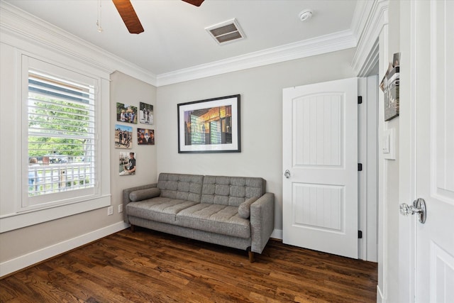 446 Arlington St, Houston, TX 77007 - living area with dark wood-style floors, ornamental molding, ceiling fan, and baseboards