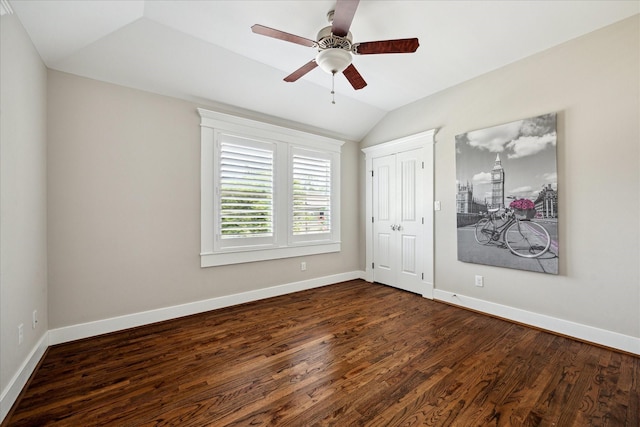 446 Arlington St, Houston, TX 77007 - unfurnished bedroom with lofted ceiling, dark wood finished floors, baseboards, a closet, and a ceiling fan