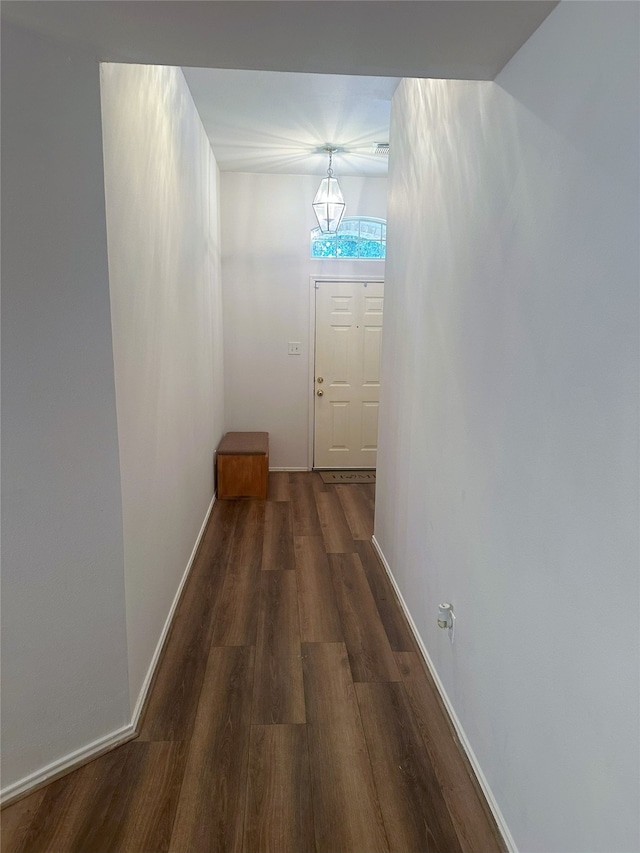 12107 English Brook Cir, Humble, TX 77346 - hallway with wood finished floors and a chandelier