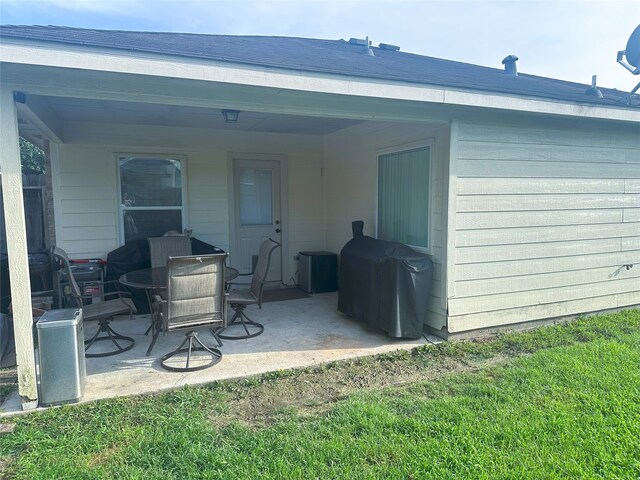 12107 English Brook Cir, Humble, TX 77346 - rear view of house featuring a patio area and a yard