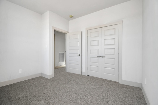 4016 Boho Ln, Houston, TX 77045 - unfurnished bedroom with carpet flooring, baseboards, and a closet