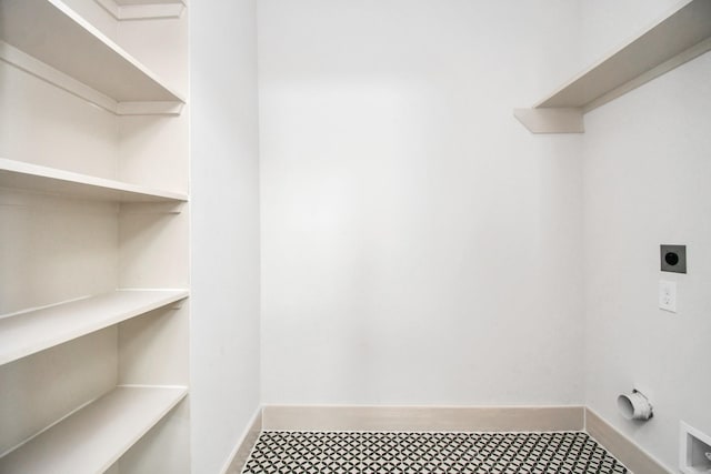 4016 Boho Ln, Houston, TX 77045 - washroom featuring electric dryer hookup and baseboards