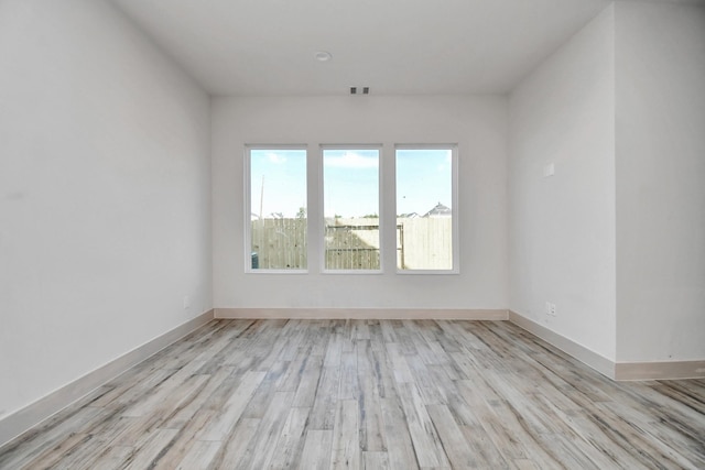 4016 Boho Ln, Houston, TX 77045 - unfurnished room featuring wood finished floors and baseboards