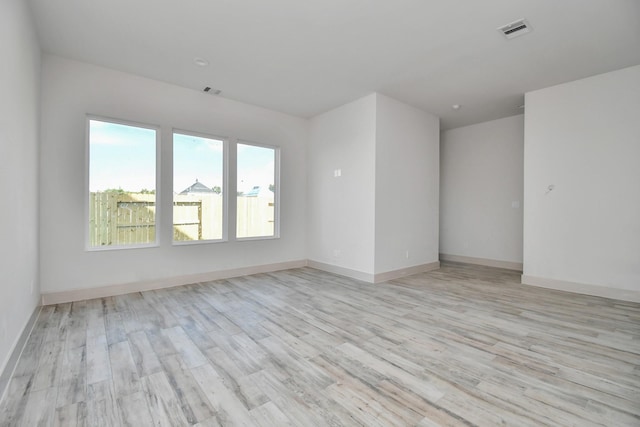 4016 Boho Ln, Houston, TX 77045 - spare room with light wood-style flooring and baseboards