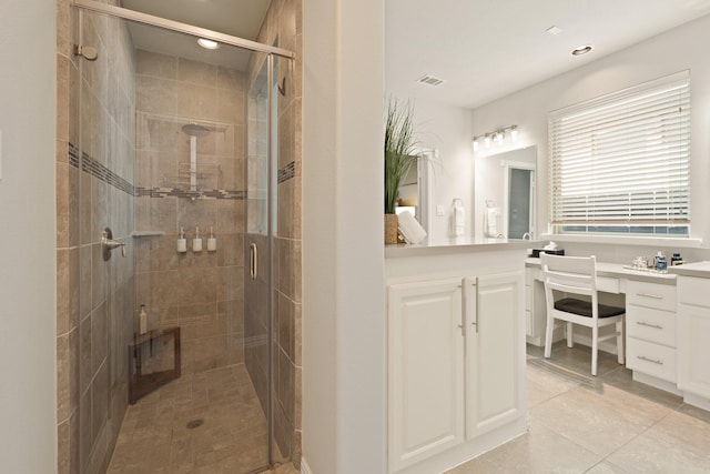 3638 Long Flower Ct, Fulshear, TX 77441 - bathroom featuring vanity, a shower stall, tile patterned flooring, and recessed lighting