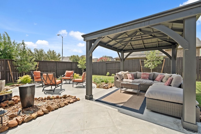 3638 Long Flower Ct, Fulshear, TX 77441 - fenced backyard featuring outdoor lounge area, a gazebo, and a patio