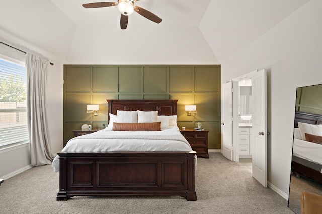 3638 Long Flower Ct, Fulshear, TX 77441 - bedroom with light carpet, multiple windows, a ceiling fan, connected bathroom, and high vaulted ceiling