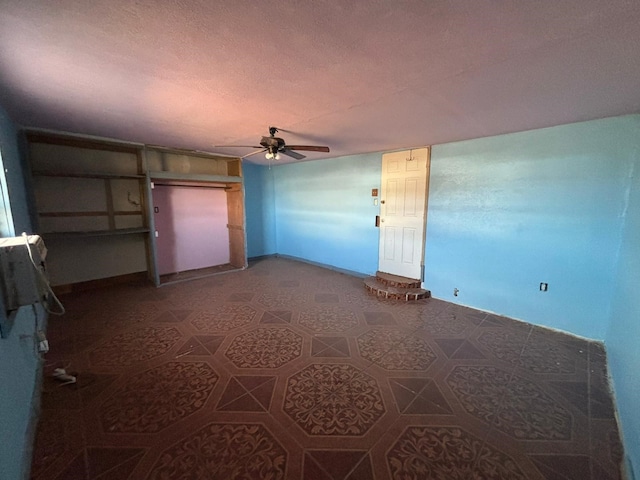 1205 14th St, Seagraves, TX 79359 - empty room featuring ceiling fan