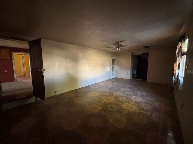 1205 14th St, Seagraves, TX 79359 - empty room with a ceiling fan