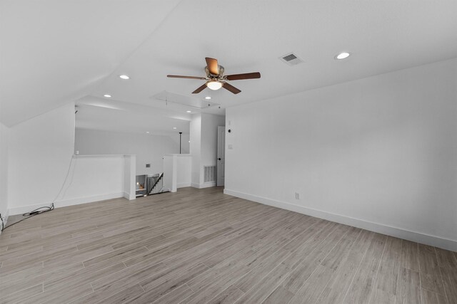 1323 Warwickshire Dr, Houston, TX 77077 - unfurnished living room with a ceiling fan, recessed lighting, light wood finished floors, attic access, and baseboards