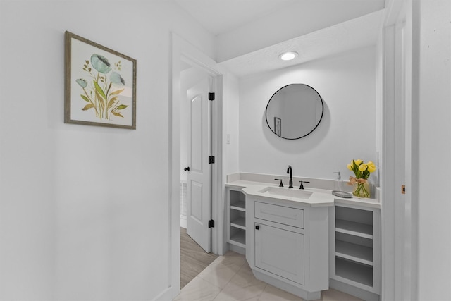 1323 Warwickshire Dr, Houston, TX 77077 - bathroom featuring vanity and baseboards