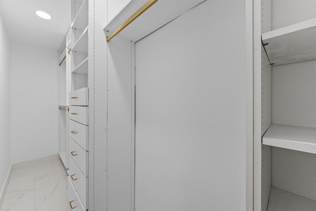 1323 Warwickshire Dr, Houston, TX 77077 - spacious closet with light marble finish flooring