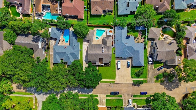 1323 Warwickshire Dr, Houston, TX 77077 - aerial perspective of suburban area featuring a pool area