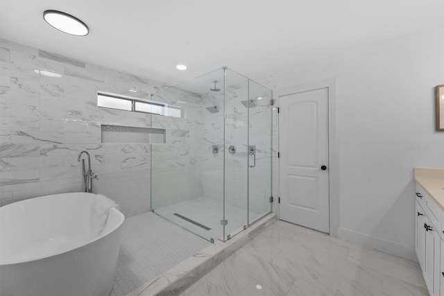 1323 Warwickshire Dr, Houston, TX 77077 - bathroom with a marble finish shower, a freestanding bath, vanity, marble look tile flooring, and baseboards
