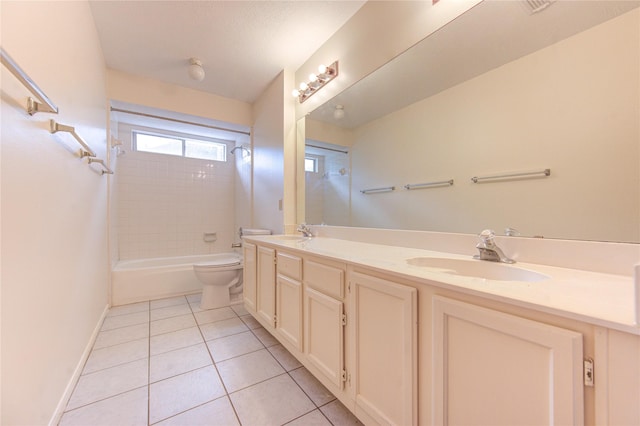 14823 Atterbury Dr, Sugar Land, TX 77498 - full bath with tile patterned floors, double vanity, toilet, washtub / shower combination, and baseboards