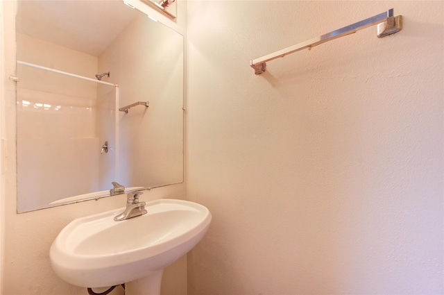 14823 Atterbury Dr, Sugar Land, TX 77498 - bathroom with a sink and a shower
