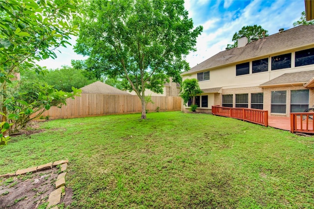 14823 Atterbury Dr, Sugar Land, TX 77498 - view of yard featuring a wooden deck