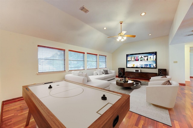 14823 Atterbury Dr, Sugar Land, TX 77498 - rec room with wood finished floors, ceiling fan, lofted ceiling, and recessed lighting