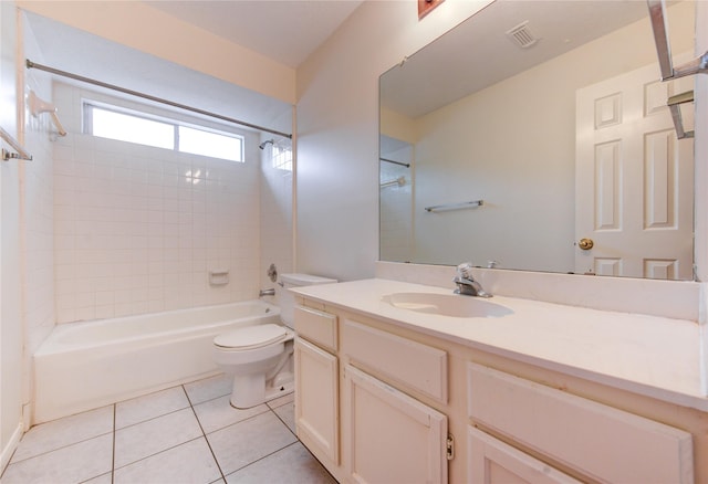 14823 Atterbury Dr, Sugar Land, TX 77498 - bathroom featuring  shower combination, toilet, tile patterned flooring, and vanity