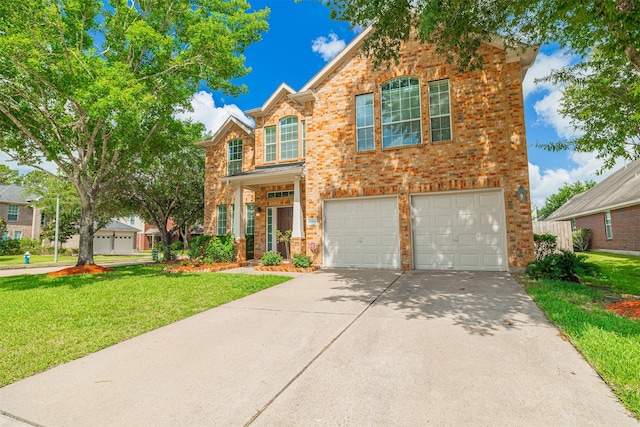 20314 Nellie Gail Trail Ln, Katy, TX 77450 - traditional-style house with concrete driveway, an attached garage, brick siding, and a front lawn