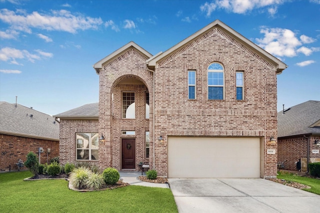 31838 Chapel Rock Ln, Spring, TX 77386 - view of front of home featuring brick siding, driveway, a front lawn, and a garage