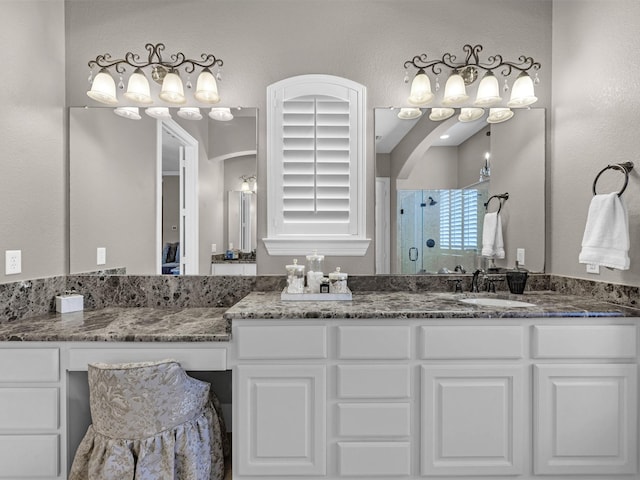 12118 Pinelands Park Ln, Humble, TX 77346 - full bathroom with a stall shower and double vanity