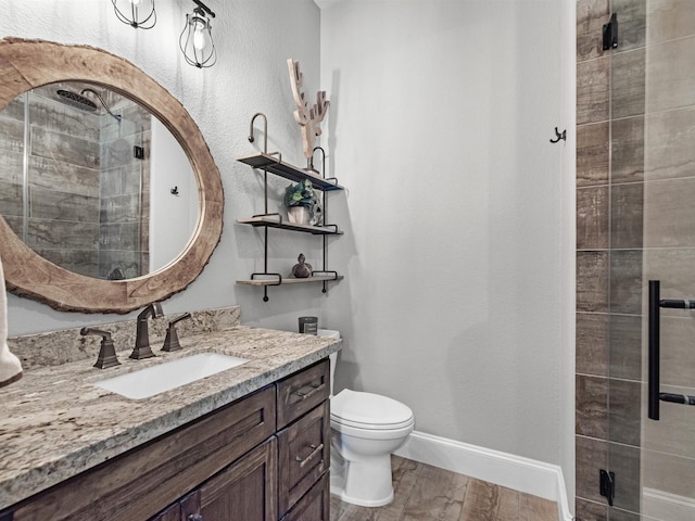 12118 Pinelands Park Ln, Humble, TX 77346 - full bath with vanity, tiled shower, and wood finished floors