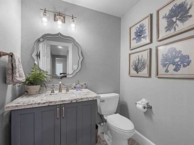 12118 Pinelands Park Ln, Humble, TX 77346 - half bathroom with vanity and tile patterned floors