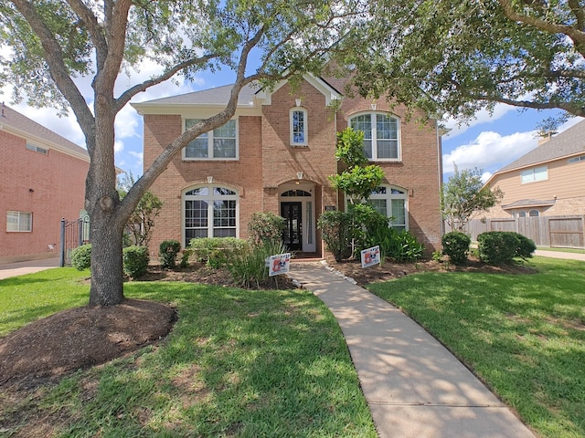 2631 Misty Grove Dr, Manvel, TX 77578 - traditional home with brick siding