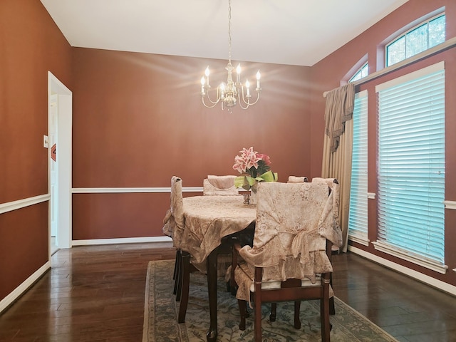 2631 Misty Grove Dr, Manvel, TX 77578 - dining room featuring a chandelier, hardwood / wood-style floors, and baseboards