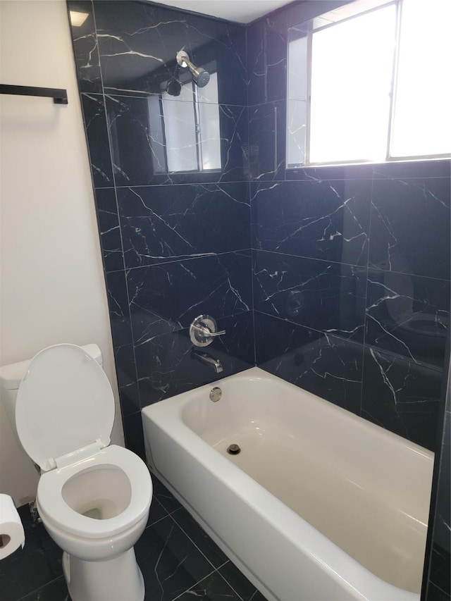 5814 Fontenelle Dr, Houston, TX 77035 - bathroom with toilet and shower / bathtub combination