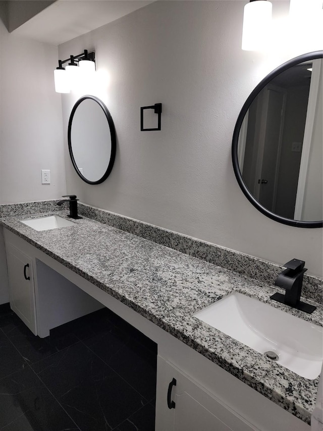 5814 Fontenelle Dr, Houston, TX 77035 - full bath with double vanity and tile patterned flooring