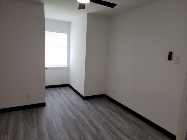 5814 Fontenelle Dr, Houston, TX 77035 - spare room with a ceiling fan, wood finished floors, and baseboards