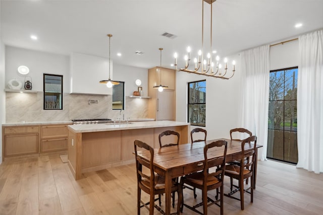 3111 Eastman St, Houston, TX 77022 - dining area featuring light wood-type flooring and recessed lighting