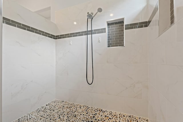 17772 W Terrace Oaks, Waller, TX 77484 - full bathroom featuring a tile shower
