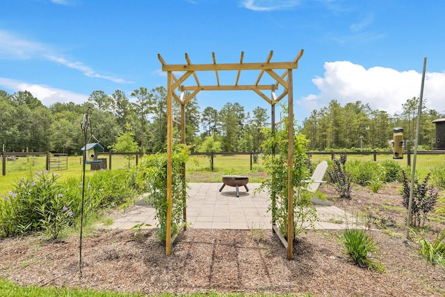17772 W Terrace Oaks, Waller, TX 77484 - view of yard with an outdoor fire pit and a patio area