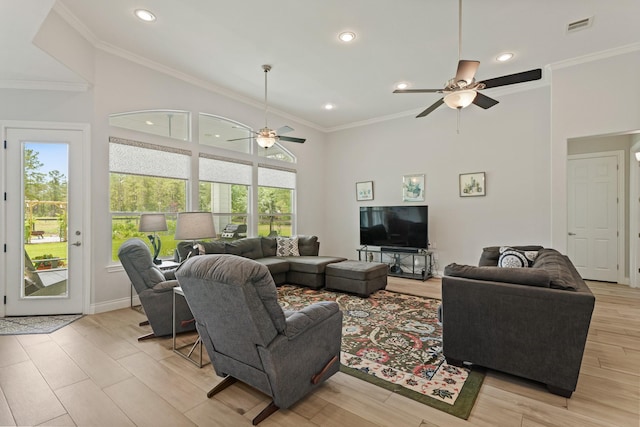 17772 W Terrace Oaks, Waller, TX 77484 - living room with a ceiling fan, crown molding, light wood-type flooring, recessed lighting, and baseboards