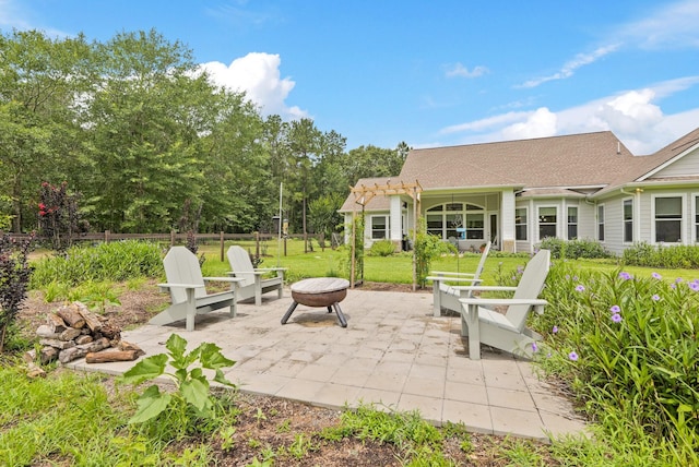 17772 W Terrace Oaks, Waller, TX 77484 - view of patio featuring an outdoor fire pit