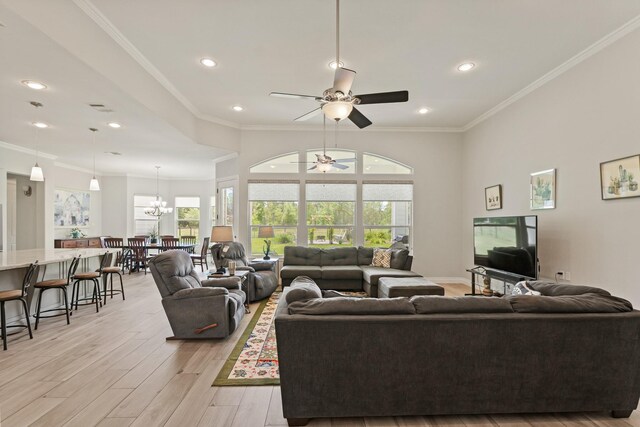 17772 W Terrace Oaks, Waller, TX 77484 - living area with a ceiling fan, light wood-style floors, ornamental molding, recessed lighting, and a chandelier