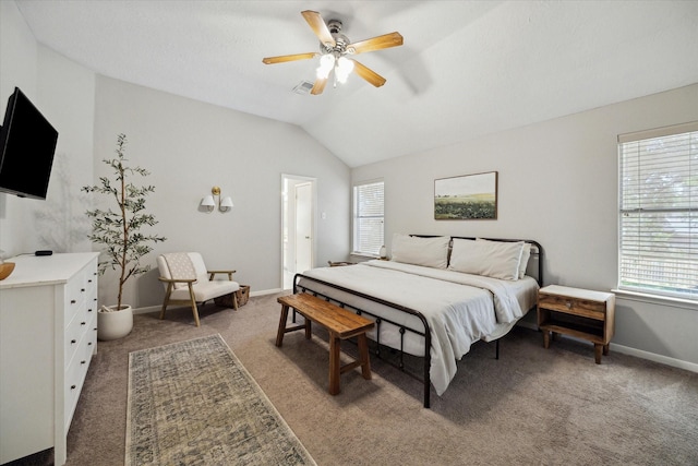 21326 Wildcroft Dr, Katy, TX 77449 - carpeted bedroom with multiple windows, vaulted ceiling, baseboards, and ceiling fan