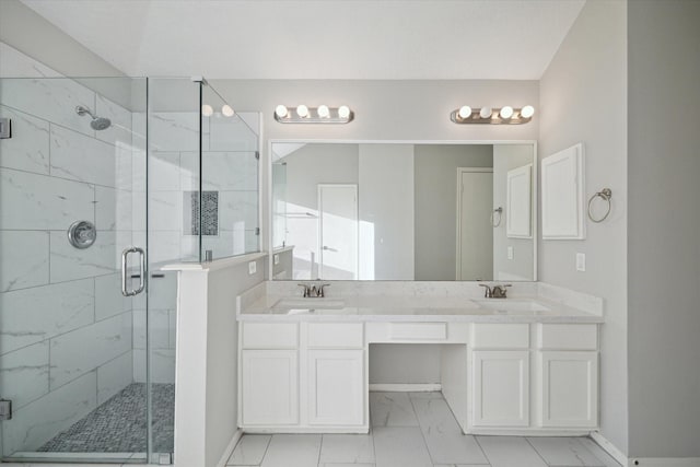 21326 Wildcroft Dr, Katy, TX 77449 - full bathroom with marble look tile flooring, a stall shower, baseboards, and double vanity