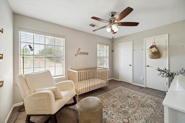 21326 Wildcroft Dr, Katy, TX 77449 - living area with plenty of natural light, carpet floors, a ceiling fan, and baseboards
