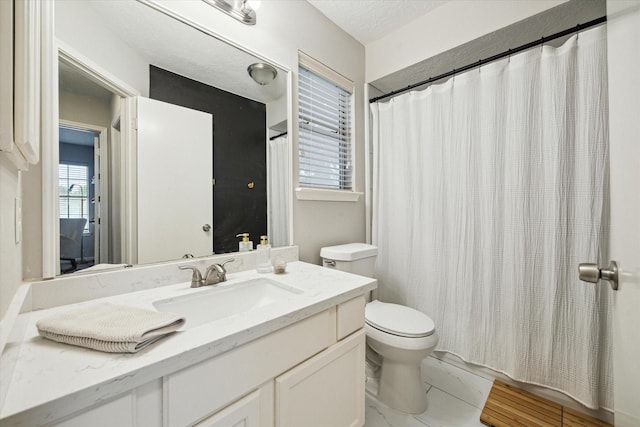 21326 Wildcroft Dr, Katy, TX 77449 - full bath with marble finish flooring, toilet, vanity, and a shower with shower curtain
