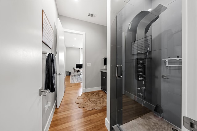 20107 Continental Dr Unit A, Lago Vista, TX 78645 - full bathroom featuring wood finished floors and a stall shower