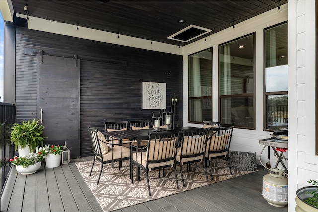 20107 Continental Dr Unit A, Lago Vista, TX 78645 - wooden deck with outdoor dining area