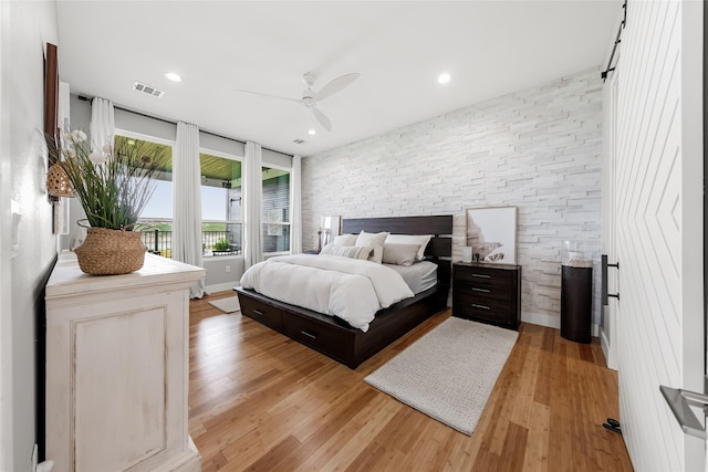 20107 Continental Dr Unit A, Lago Vista, TX 78645 - bedroom with light wood-type flooring, recessed lighting, and a ceiling fan