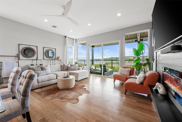 20107 Continental Dr Unit A, Lago Vista, TX 78645 - living room with a ceiling fan, recessed lighting, and light wood-style flooring