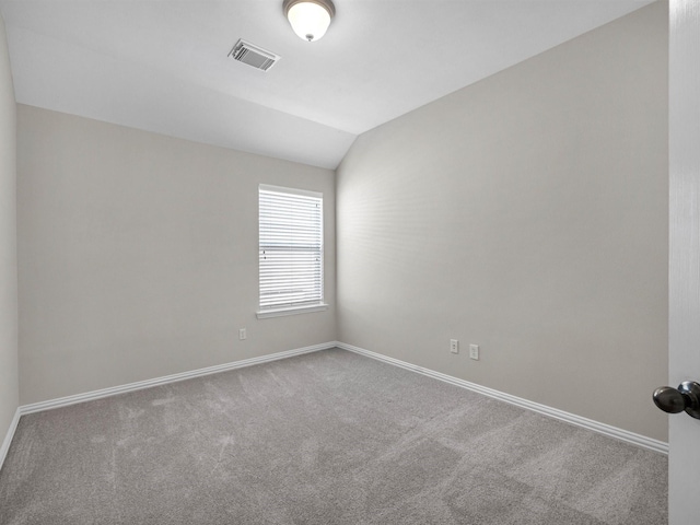 14402 Cottage Timbers Ln, Houston, TX 77044 - carpeted empty room featuring lofted ceiling and baseboards