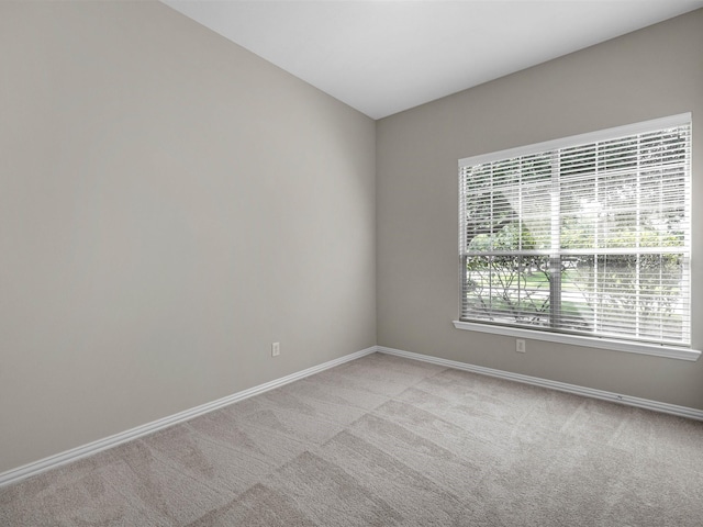 14402 Cottage Timbers Ln, Houston, TX 77044 - unfurnished room featuring baseboards and light carpet